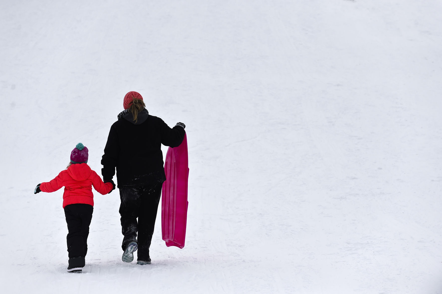 Hiking up the sledding hill